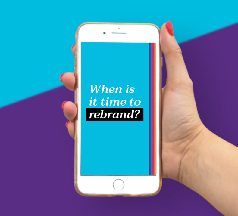 A hand holding a smartphone with a question on it