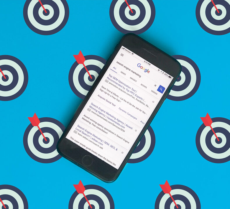 A cellphone on a bullseye target background