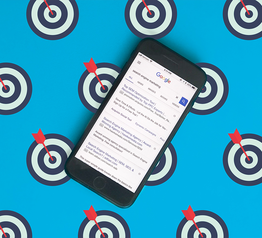 A cellphone on a bullseye target background